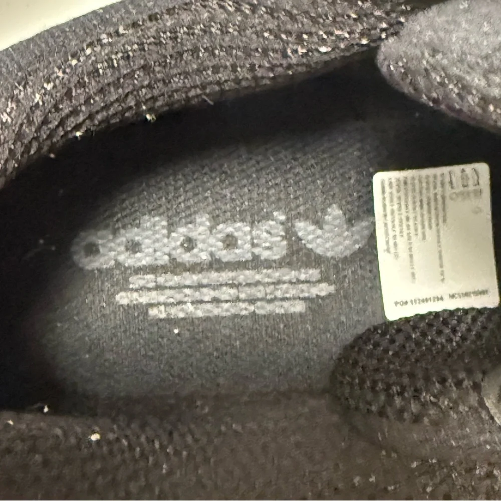 Black Adidas Sneakers with colorful sole